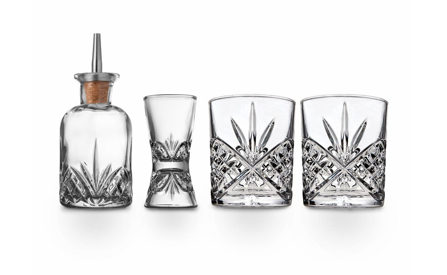 Close-up of whiskey glasses and decanter from the Dublin Collection by Duvall Designs, showcasing luxurious texture and masculine sophistication.