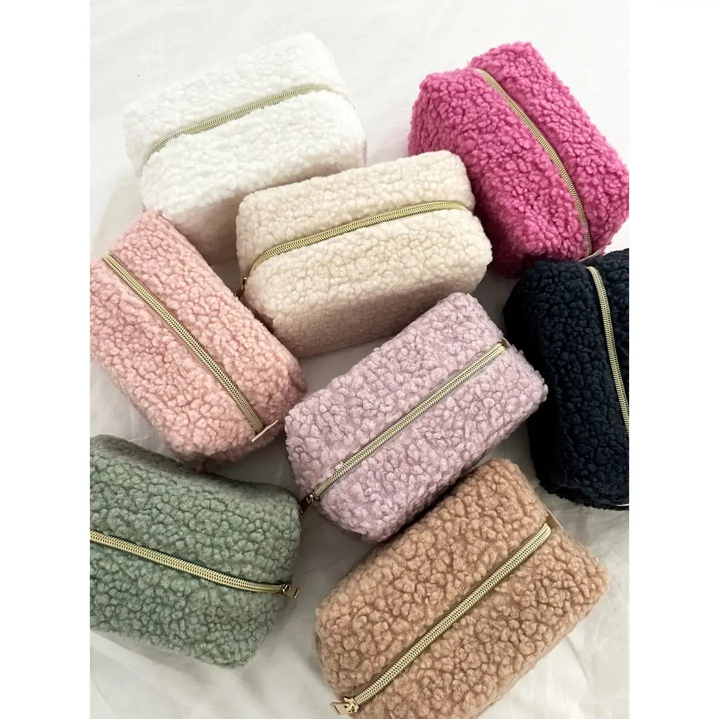 Fuzzy teddy bear travel pouch that’s both stylish and practical.