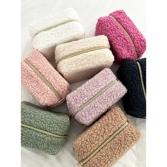 Fuzzy teddy bear travel pouch that’s both stylish and practical.