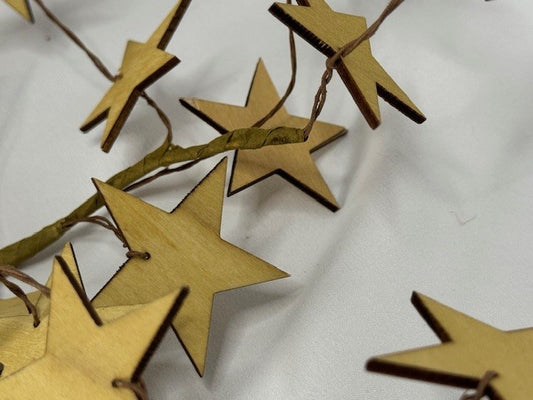 Gold star twig spray with metallic wooden stars, perfect for Christmas or wedding centerpieces.